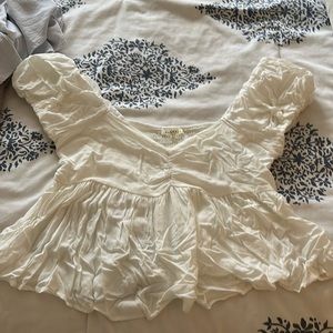 Short puff sleeves blouse, scrunched top and ruffle bottom